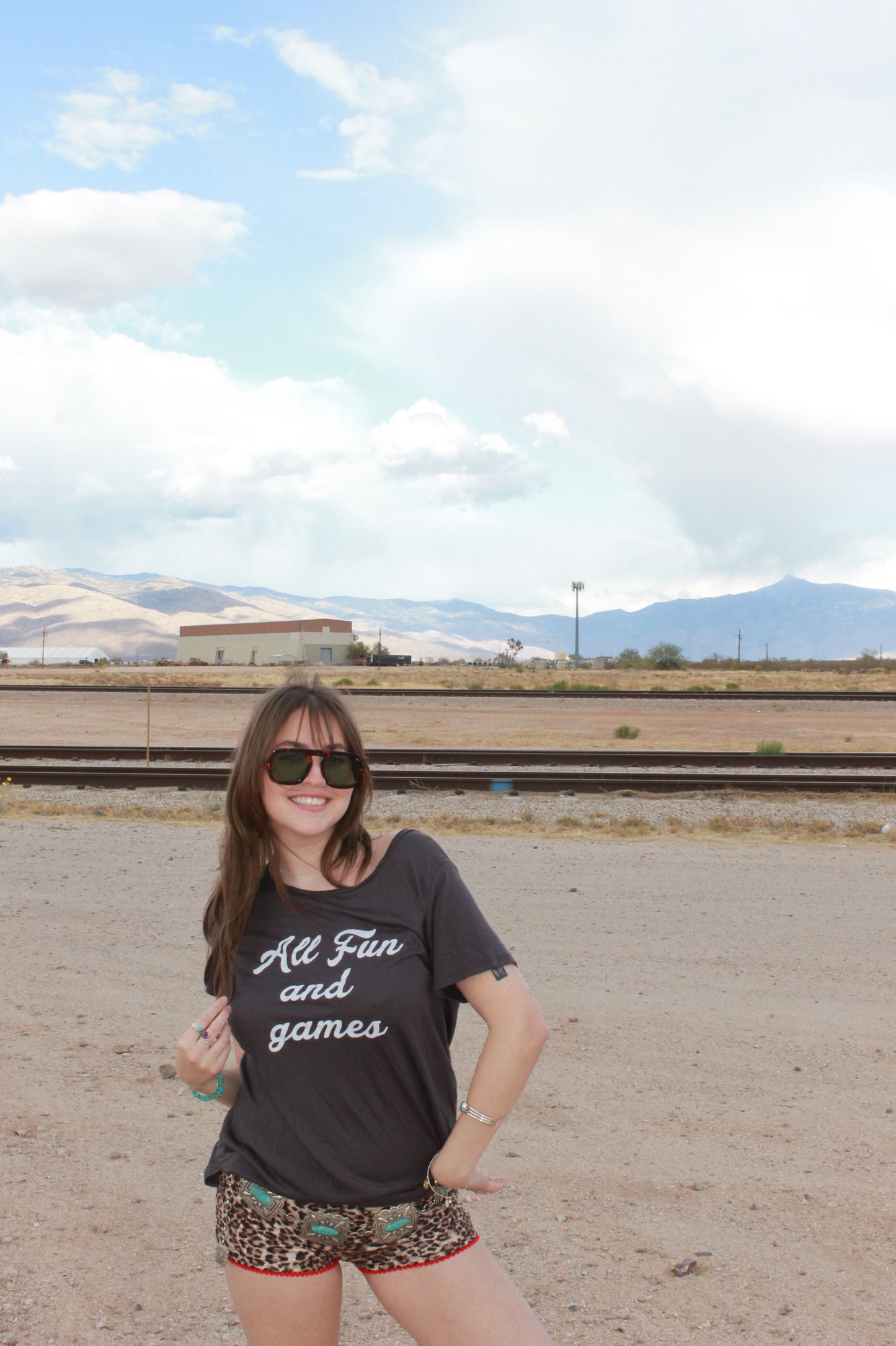 "all fun and games" tee