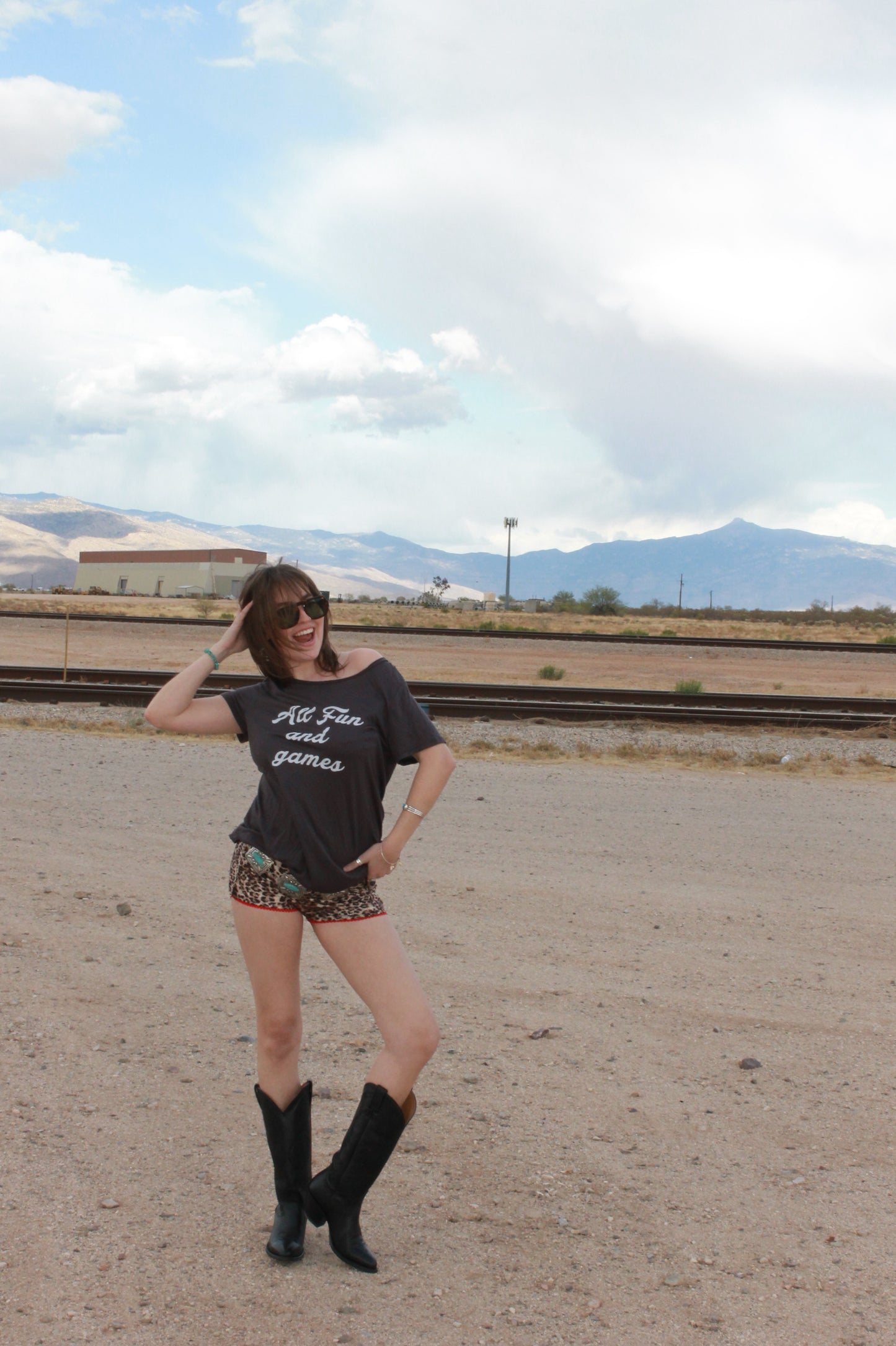 "all fun and games" tee