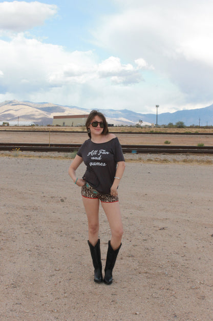 "all fun and games" tee