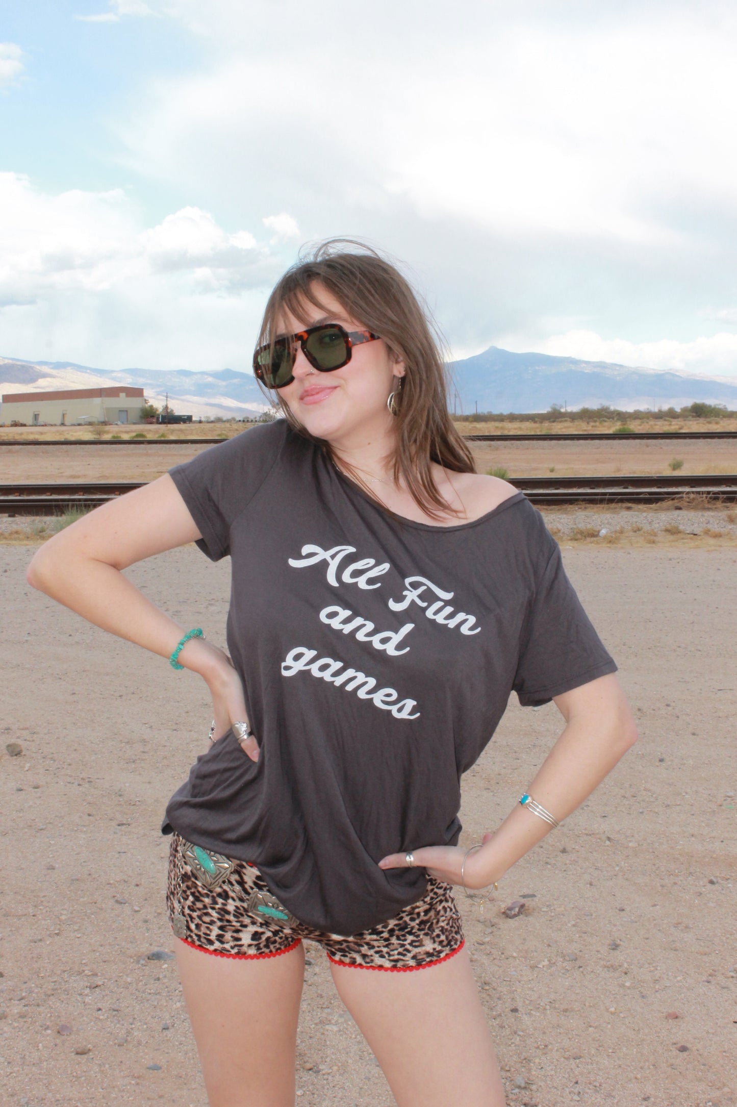 "all fun and games" tee