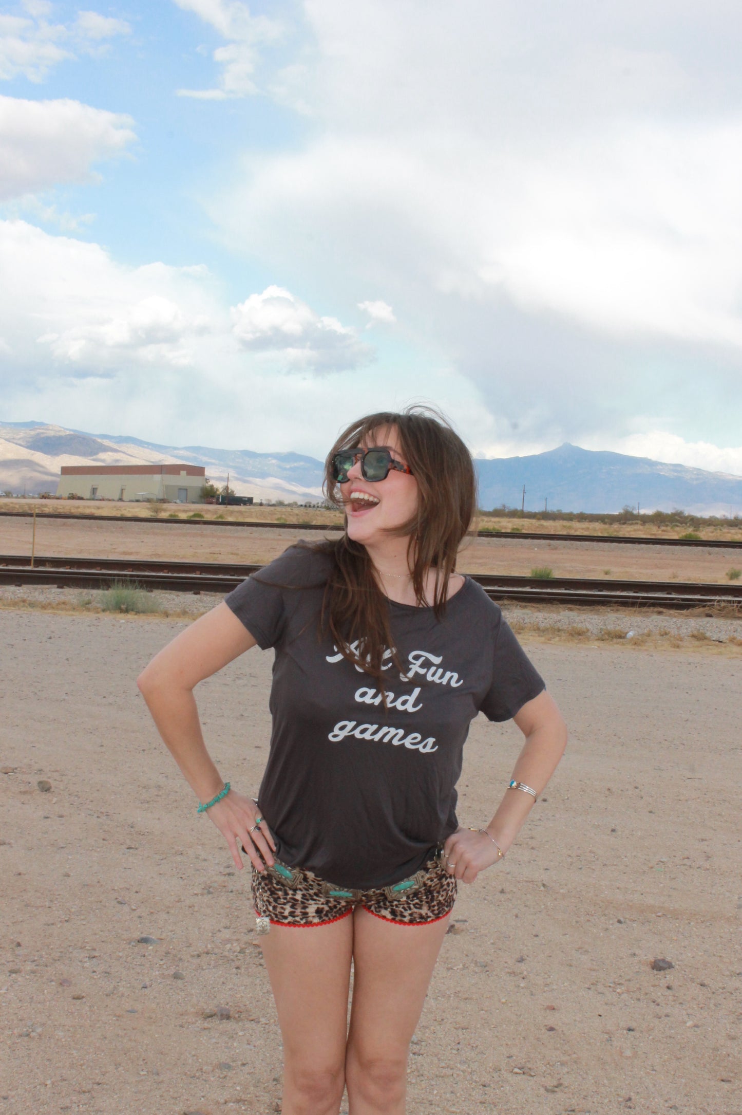 "all fun and games" tee