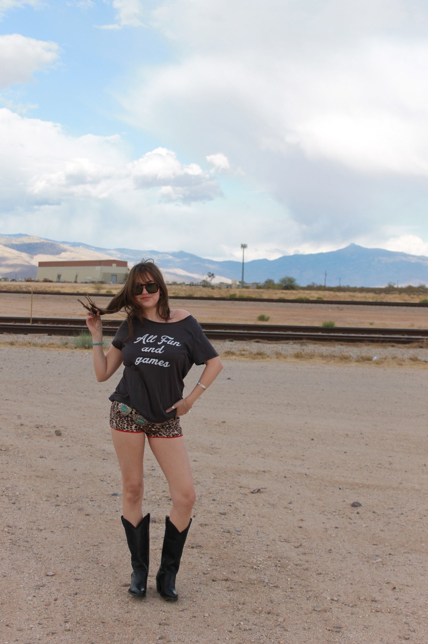 "all fun and games" tee