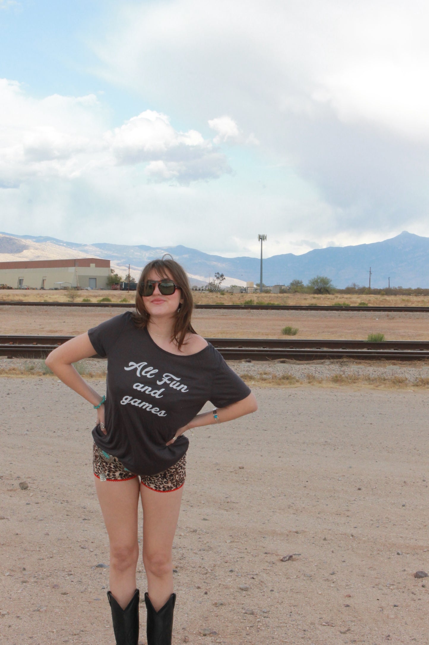 "all fun and games" tee