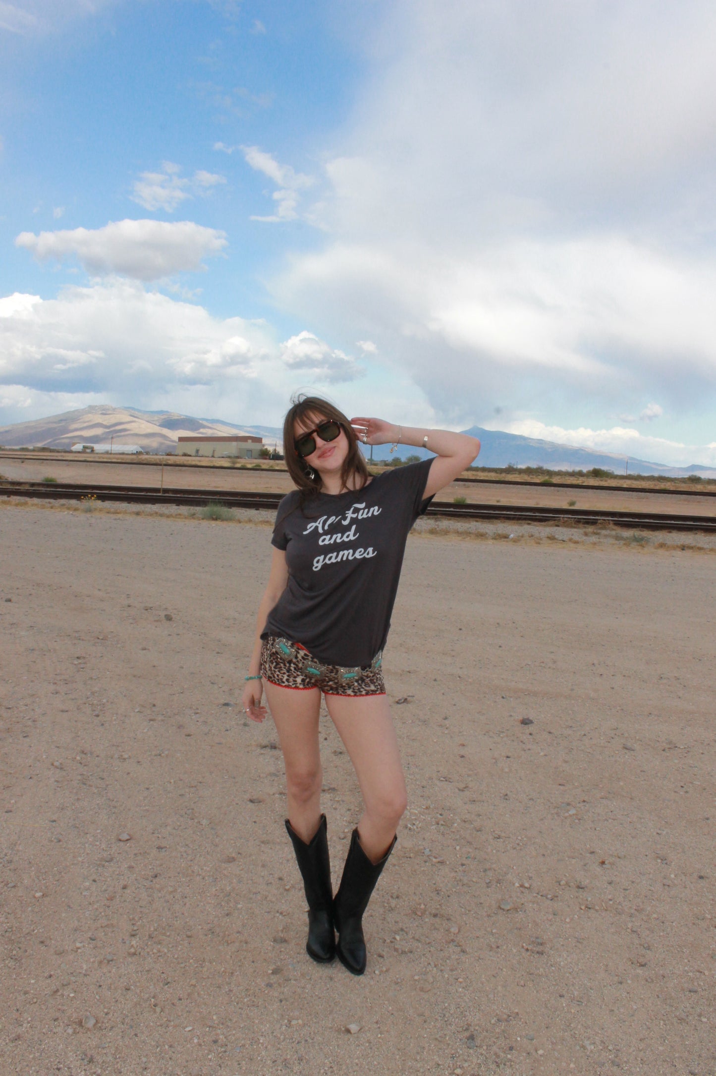 "all fun and games" tee