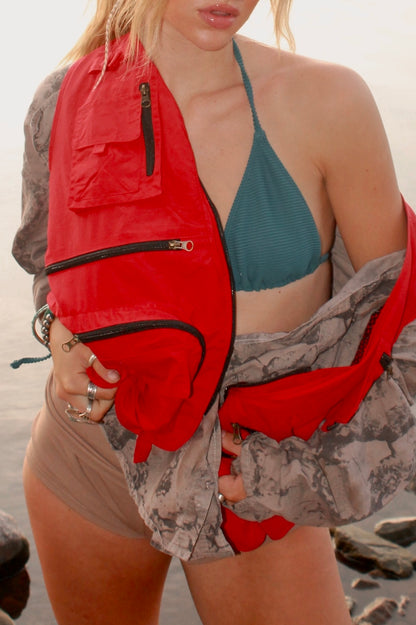 “alluring” vest